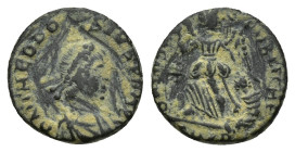 Theodosius I (379-395). Æ (12mm, 1.2 g). Cyzicus, 383-395. Pearl-diademed, draped and cuirassed bust r. R/ Victory advancing l., carrying trophy over ...