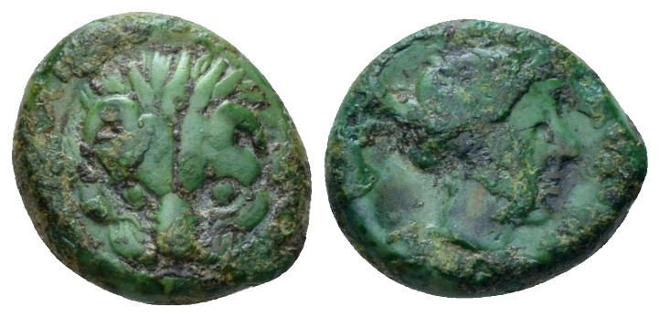 Bruttium, Rhegium Bronze circa 351-280, Æ 12.00 mm., 2.12 g.
Lion's mask facing...