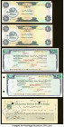Saudi Arabia and United Arab Emirates Group Lot 8 Examples Very Fine-Crisp Uncirculated. The two UAE notes grade Very Fine and the checks grade betwee...