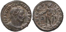 284-305 d.C. Diocleciano. Trier 1ª oficina. Nummus. Ae. 10,28 g. /GENIO POPVLI ROMANI. Genio estante a izquierda. EBC. Est.40.