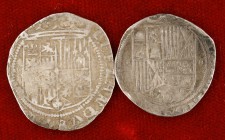 Reyes Católicos y Austrias. Granada y Sevilla. 1 real. Dos monedas. Recortadas. (BC+).