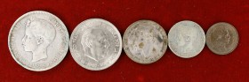 1884 a 1949. 2 céntimos, 1, 2 y 5 pesetas (dos). Lote de 5 monedas españolas, una falsa de época. A examinar. BC-/MBC+.