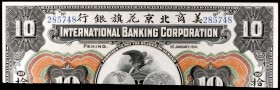 1910. China. International Banking Corporation. 10 dólares. (Pick 5414). Pekín, 1 de enero. Cortado por la mitad. Raro. (S/C-).