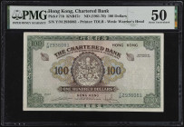 (t) HONG KONG. The Chartered Bank. 100 Dollars, ND (1961-70). P-71b. PMG About Uncirculated 50.
Printed by TDLR. Watermark of warrior's head. PMG com...