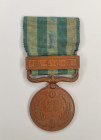 Japanese Empire. Military medal for the Chinese Incident, 1900. (Boxer Rebellion Medal)
Japanese Empire. 1903 Diameter: 30.5 mm. Bronze, silk, moire....