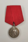 Medal in memory of the reign of Emperor Alexander III. On a medal bar, with a ribbon of the Order of St. Alexander Nevsky.
Russian Empire. St. Peters...