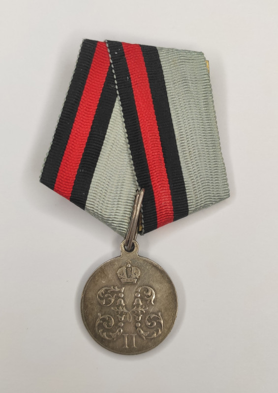 Medal "For a march to China" On an old medal bar with a stamp "Патент Черных 561...