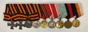 Medal bar with 2 St. George's crosses and 7 medals.
1. St. George Cross 3rd class No. 25892. Russian Empire, Petrograd Mint. 1914 Silver, 41 x34 mm. ...