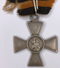 St. George's Cross, 3rd class, No. 90003, with a fragment of the original St. George ribbon. 
Russian Empire, Petrograd Mint. 1915. Size: 40 x 34 mm....