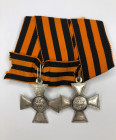 Medal bar with two St. George's Crosses:
1. George Cross 3rd class No. 278. Russian Empire, private manufactory. After 1917. Size: 41 x 36mm. Silver....