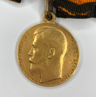 St. George Medal (For Bravery) 1st class, No. 16413 on handmade medal bar with a ribbon. 
Russian Empire, Petrograd mint, 1915. Medalist A.F. Vasyuti...