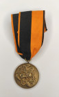 Medal in memory of participation in the battles in Courland. Germany, early 1920s.
Weight (with ring): 11.72 g. Diameter: 32 mm. Bronze, gilding. Exc...