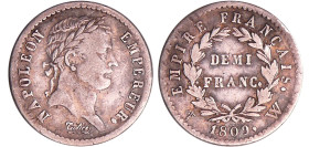 Napoléon 1er (1804-1814) - 1/2 franc revers empire 1809 W (Lille)
TB+
Ga.399-F.178
 Ar ; 2.43 gr ; 18 mm