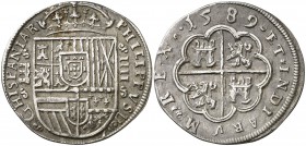 1589. Felipe II. Segovia. 4 reales. (Cal. 372, mismo ejemplar). 11,77 g. Acueducto de dos arcos y un piso. El escudo divide la leyenda. Ex Colección L...