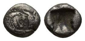 Kingdom of Lydia, Kroisos AR 1/12 Stater. (7.7mm, 0.8 g) Sardes, circa 561-546 BC. Confronted foreparts of lion to right and bull to left / Incuse squ...