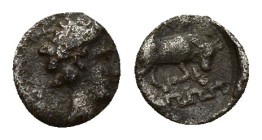 Ionia, Magnesia ad Maeandrum AR Tetartemorion. (5.8mm, 0.2 g) Circa 450-400 BC. Head of Apollo(?) right / MAΓNH, humped bull butting right, maeander p...