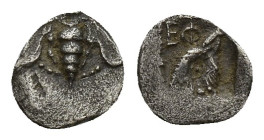 Ionia. Ephesos circa 500-420 BC. Tetartemorion AR (6.8mm, 0,1 g). Bee with slightly curved wings; annulet to left and right / Ε Φ, head of eagle right...