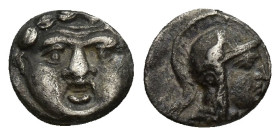 Pisidia. Selge. Obol. 350-300 BC. (9.3mm, 1 g). Anv.: Facing gorgoneion. Rev.: Helmeted head of Athena to right.