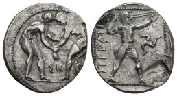 Pamphylia, Aspendos AR Stater. (23mm, 10.9 g) Circa 380-325 BC. Two wrestlers grappling; ΣK between / Slinger in throwing stance to right; EΣTFEΔIIY[Σ...