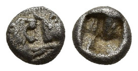 KING OF LYDIA. Kroisos. (circa 560-546 BC). 1/24 Stater. Sardes. (6mm, 0.4 g) Obv: Confronted foreparts of bull and lion. Rev: Incuse punch.