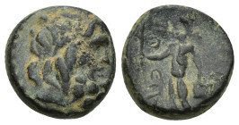 Lycaonia. Eikonion circa 100-27 BC. Bronze Æ (15mm, 4,2 g) Laureate head of Zeus right / Naked Perseus standing left., holding harpa and gorgon's head...