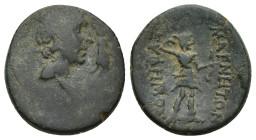 Ionia, Magnesia ad Maeandrum, Time of Octavian Æ (18mm, 4.2 g). Circa 47-27 BC. Euphemos, magistrate. Laureate head of Julius Caesar to right, being c...
