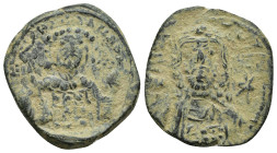 Michael VII Æ Nummus. (22mm, 5.8 g) Constantinople, AD 1071-1078. [+MIXAHΛ RAC]IΛ O Δ, crowned bust of Michael, wearing loros, holding labarum and glo...