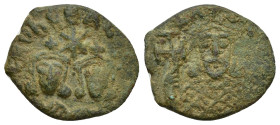Basil I with Leo and Alexander. AE (16mm, 2.4 g) LEON CE ALESA, crowned bust facing of Leo, no beard, on left and crowned bust facing of Alexander, no...