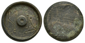 Coin Weights. 6th century. Æ Three Nomismata Weight (20mm, 13.4 g).
