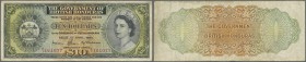 British Honduras: Government of British Honduras 10 Dollars April 1st 1964, P.31b, still a nice note with crisp paper and bright colors, several folds...