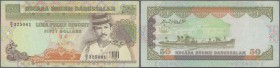 Brunei: 50 Ringgit P. 16 used but with error print, missing signature titles and signatures at center, rare error, condition: F to F+.