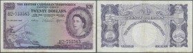 East Caribbean States: 20 Dollars 1959 P. 11, used with folds and creases, no holes or tears, light staining at lower border, still original colors, c...