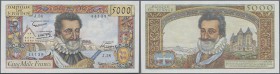 France: 5000 Francs 1958 P. 135 in extraordinary condition for this type of note, only one light center bend and 2 pinholes, crisp paper and bright co...