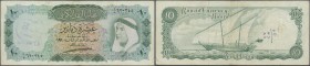 Kuwait: 10 Dinard ND P. 5, used with vertical folds and bank stamp in watermark area, no holes, one minor tear at lower right corner, small writing on...