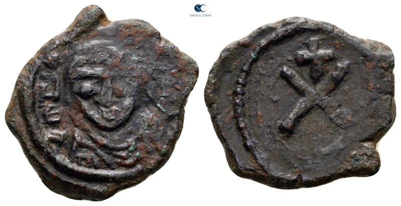 Maurice Tiberius AD 582-602. Constantinople
Decanummium Æ

20 mm, 3,54 g

...