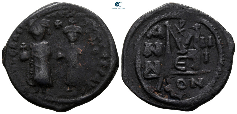 Heraclius with Heraclius Constantine AD 610-641. Constantinople
Follis or 40 Nu...