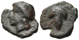 Sicily, Tauromenion, c. 325-275 BC. Æ (13,8 mm, 2 g). Laureate head of Apollo Archegetes l. R/ Bunch of grapes, vine above. CNS 12; SNG ANS -; SNG Mor...