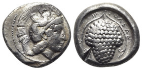 Cilicia, Soloi, c. 410-375 BC. AR Stater (21mm, 10.66g, 11h). Head of Athena r., wearing crested Attic helmet decorated with griffin. R/ Grape bunch o...