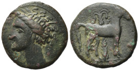 Zeugitania, Carthage, c. 400-350 BC. Æ (16, 10 mm, 2,71 g). Head of Tanit l., wearing wreath of grain ears, triple-pendant earring, and necklace. R/ H...