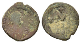 Justinian I (527-565). Æ 40 Nummi (30,5 mm, 17,8 g). Constantinople. Diademed, draped and cuirassed bust r. R/ Large M flanked by star and cross; abov...