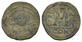 Justinian I (527-565). Æ 40 Nummi (38 mm, 22 g). Constantinople, year 14 (AD 540/1). Helmeted and cuirassed bust facing, holding globus cruciger and s...