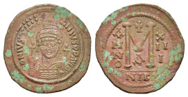 Justinian I (527-565). Æ 40 Nummi (41,3 mm, 22,4 g). Nicomedia, year 13 (AD 539/40). Helmeted and cuirassed bust facing, holding globus cruciger and s...