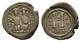 Justin II and Sophia (565-578). Æ 40 Nummi (30,7 mm, 15,4 g), Nicomedia, year 11 (AD 575/6). Justin and Sophia seated facing on double throne, holding...