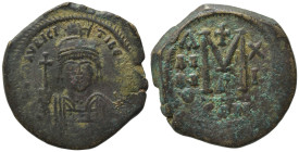Maurice Tiberius (582-602). Æ 40 Nummi (28,53 mm, 11,53 g). Constantinople, year 11 (AD 592/3). Helmeted and cuirassed bust facing, holding globus cru...