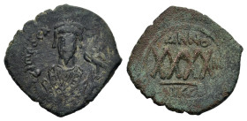 Phocas (602-610). Æ 40 Nummi (28 mm, 12 g). Nicomedia, year 3 (AD 604/5). Consular bust facing. R/ Large XXXX; in exergue, NIKOB. Sear 658. About very...