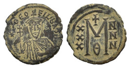 Theophilus (829-842). Æ 40 Nummi (28 mm, 8 g). Constantinople, AD 829-842.Crowned bust facing, wearing chlamys, holding patriarchal cross and akakia; ...