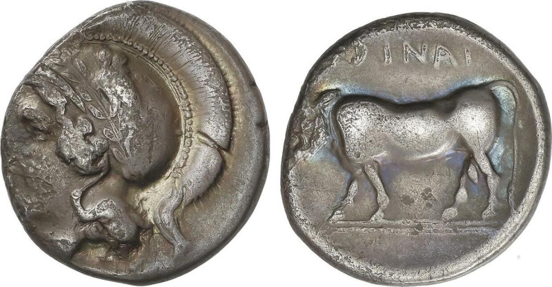 Didracma. 405-385 a.C. HYRIA. CAMPANIA. Anv.: Cabeza de Atenea a izquierda con c...