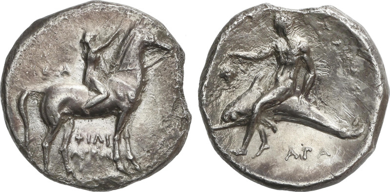 Nomos. 302-280 a.C. TARENTUM. CALABRIA. Anv.: Joven a caballo a derecha, sosteni...