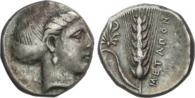 Estátera. 400-340 a.C. METAPONTO. LUCANIA. Anv.: Cabeza de Deméter a derecha. Rev.: Espiga vertical con hoja, flor a izquierda y leyenda a derecha: ME...