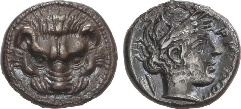 Dracma. 415-387 a.C. RHEGION. BRUTTIUM. Anv.: Cabeza de león de frente. Rev.: Ca...